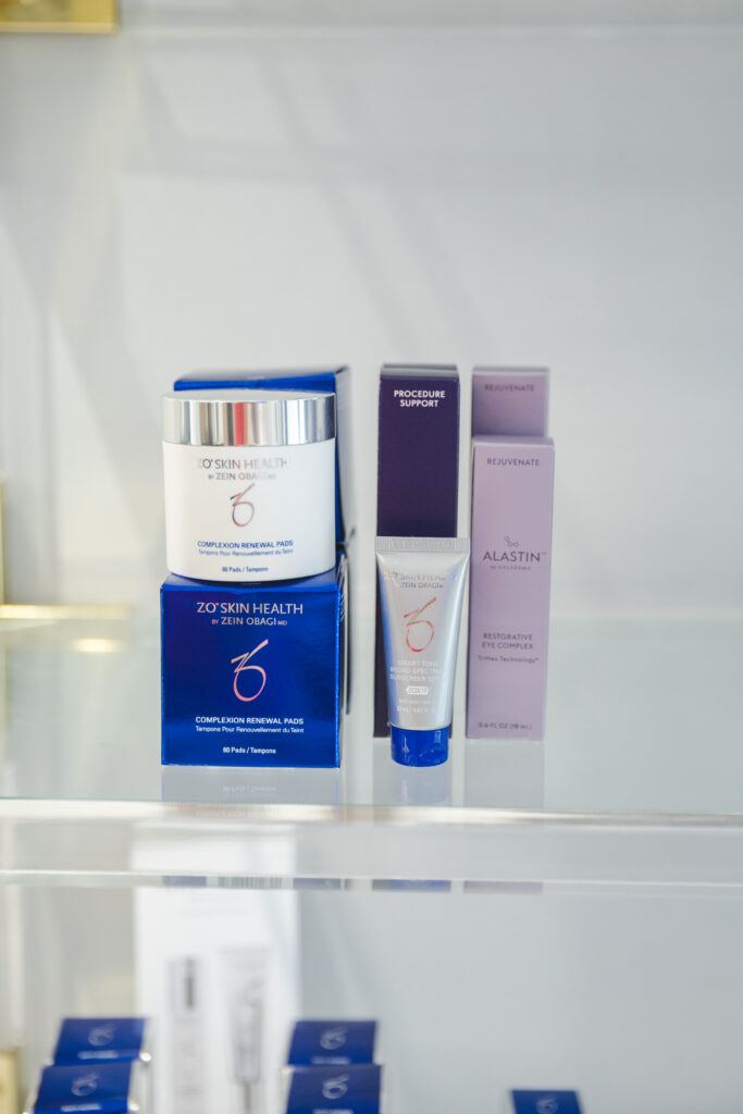 Professional skincare products displayed on a clean shelf at Pine & River Aesthetics, featuring medical-grade anti-aging and skin rejuvenation treatments.