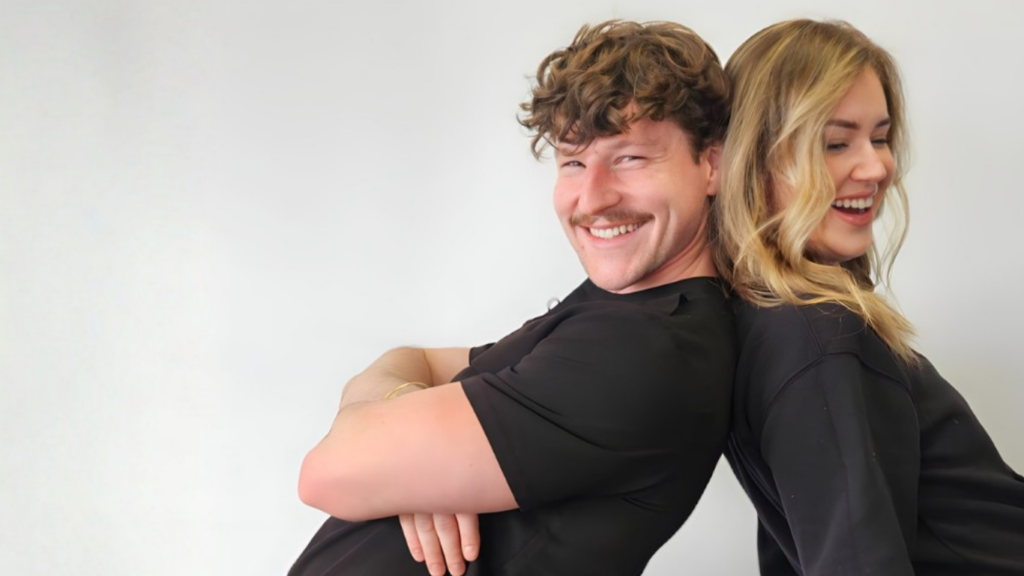Patients smiling during a consultation at Pine & River Aesthetics in Little Rock, Arkansas while exploring personalized aesthetic treatment options.